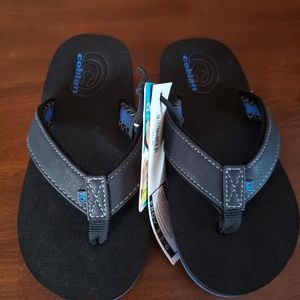 Boys size 3/4 black and blue flips